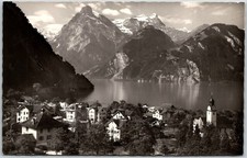 Village of Sisikon with Urirotstock Mountain and Lake Lucerne Vintage Postcard picture
