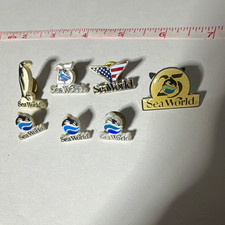 Vintage SeaWorld Lot of 7 Souvenir Pinbacks Pins Amusement Parks Theme picture