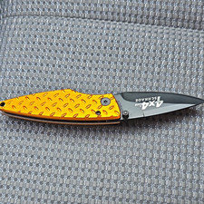 Schrade 4x4 Orange/Black Aluminum Handle SS Plain Drop Point Liner Clip picture