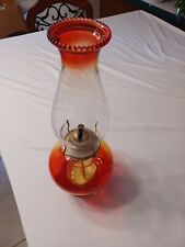 VINTAGE AMBERINA GLASS OIL LAMP WITH SHADE, WICK, AND WICK CONTROL KNOB picture