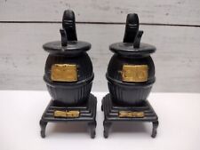 Vintage Plastic Or Celluloid Pot Belly Stove Salt And Pepper Shakers picture