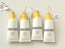 NWT Bloomingdales 4pc Set Sunscreen Ornaments Glass Christmas Tree Spa Resort picture