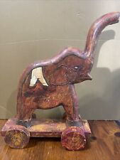 VINTAGE WOODEN ELEPHANT ON WHEELS WITH BRASS ACCENTS picture