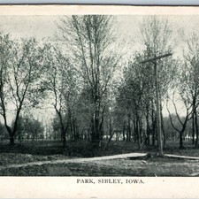 c1910s Park, Sibley, IA Postcard Public View Telegraph Pole Sidewalk Litho DB picture