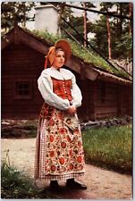 VINTAGE POSTCARD WOMAN IN TRADITIONAL DRESS FROM THE SKANSEN REGION OF SWEDEN picture