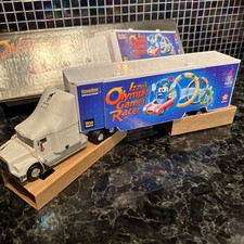 Texaco Izzy's 1996 Olympic Games Toy Car Carrier #4 W/ Mascot  Series Truck NIB picture