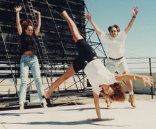 1990s Two Women Man Friends Jumping Doing Cartwheel Rooftop Playful Fun picture