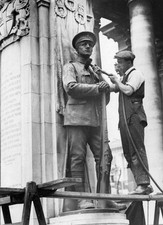 Worker uses a flexible drive to assist with cleaning process of thi- Old Photo picture