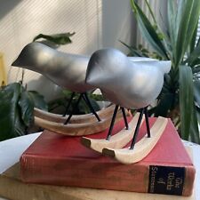 Pair of West Elm silver rocking birds picture