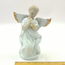 Porcelain Angel Figurine Playing Flute Gold Trim Glossy 3D Effect 8.5 in picture