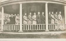 Many People Lined Up On Porch Postcard picture