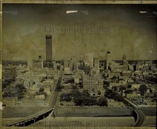Press Photo Distant view of the skyscrapers in a city - lra16413 picture