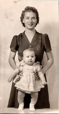 Vintage 1940s Black & White Photo Young Woman Holding Baby Portrait Sepia Tone picture