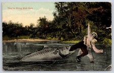 Fisherman being eaten by giant fish in a funny cartoon 1914 picture