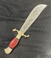 The Trader Tramontina Inox Fixed Blade Knife and Fur Covered Sheath  picture