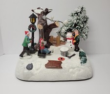Gerson Holiday Lighted Snowy Scene With Kids, Swing And Snowman picture