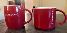 Set of 2- 2011 and 2012 Starbucks Coffee Mugs Red with White Embossed Text picture