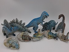 Vintage AAA Collectible Dinosaur Adults and Babies Hatching Egg picture