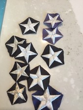 300 + CUT OUT STARS FROM A FLOWN DISTRESSED USA FLAG ( PLEASE READ DISCRIPTION ) picture