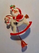 VINTAGE PLASTIC SANTA RIDING ROCKING HORSE MECHANICAL PULL STRING BROOCH PIN  picture