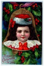 1910 Christmas Pretty Woman Bell Holly Berries Embossed Sturgeon Bay WI Postcard picture