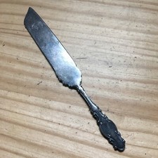 Antique 1890s WM Rogers Silver Plate Bread Cake Knife Saw Tooth Ornate Handle picture