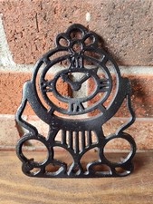 Antique Cast Iron Stand/TRIVET Art Deco picture