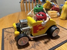 M&Ms Yellow Hot Rod Roadster Candy Dispenser Red And Green M&M Characters picture