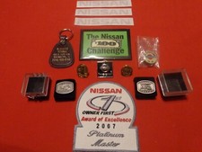 VINTAGE 12 PIECE NISSAN MOTORS ADVERTISING & EMPLOYEE AWARDS-  NEVER USED  # 501 picture
