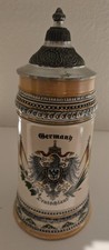 GERMAN LIDDED BEER STEIN W/GERMAN EAGLE SYMBOL IN CENTER - 8