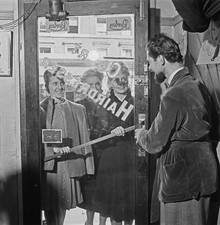 Hairdresser Mr Charles welcomes three female models to his Maison - 1943 Photo picture