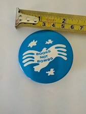 Vintage Pin Pinback Button Retro Books Not Bombs Peace Blue White Bird picture