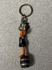 Vintage Warner Bros. Looney Tunes Daffy Duck keychain standing on a barrel picture