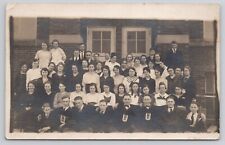 Class Photo of Young Men and Women Some with 20 Markers c1918-1930 RPPC Postcard picture