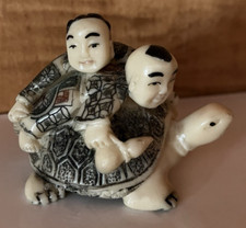 2 CHILDREN on a TURTLE /TORTOISE netsuke 1.75