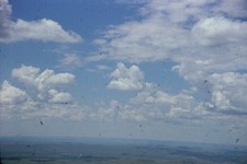 c1960's Kodachrome 35mm Slide, Blue Sky White Clouds Distant Landscape View picture