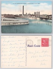 International Falls MN International Bridge 1954 Postcard Paper Mill picture