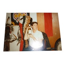 Original 1980s Interior Snapshot: Man with Wine Bottle & Indigenous Decor picture