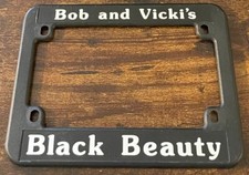 Bob and Vicki's Black Beauty Motorcycle Booster License Plate Frame PLASTIC picture