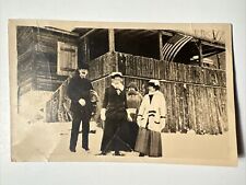 antique FRIENDS in the SNOW 1900s Vintage RPPC Photo AMERICAN FLAG Log Cabin picture