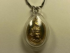 Vintage Golden Thai Buddha Amulet with a New 24