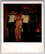 Vtg Polaroid Snapshot Photo Four Women Posing Indoors Floral Outfits 1970s picture