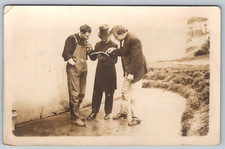 RPPC c1910s Three Men Reading Book Top Hat Workwear Scene Postcard picture