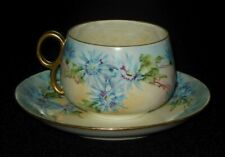 ANTIQUE HAND PAINTED GOLD DOUBLE LOOPED HANDLE CUP AND SAUCER BLUE FLOWERS picture