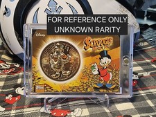 UNOPENED PACK UNKNOWN RARITY....Scrooge Money Bin Metal Coin 2026  Disney Neon picture