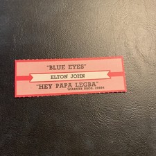 1 JUKEBOX TITLE Strip Elton John Blue eyes/hey papa Legba warner bros. 45 picture