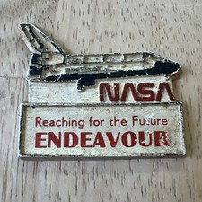 Vintage NASA reaching for the future endeavor magnet picture