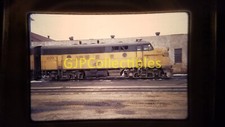 22210 35MM Train Slide ENGINES CARS STATIONS CNW 220 EX 4091-A 3/73 picture