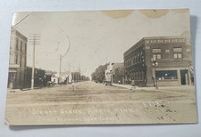 1923 RPPC AITKIN MINNESOTA FIRST NATIONAL BANK STREET SCENE EARLY AUTOS GARAGE picture