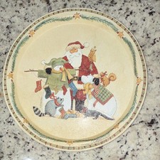 Vintage 13-inch round metal Christmas serving tray featuring a holiday scene. picture